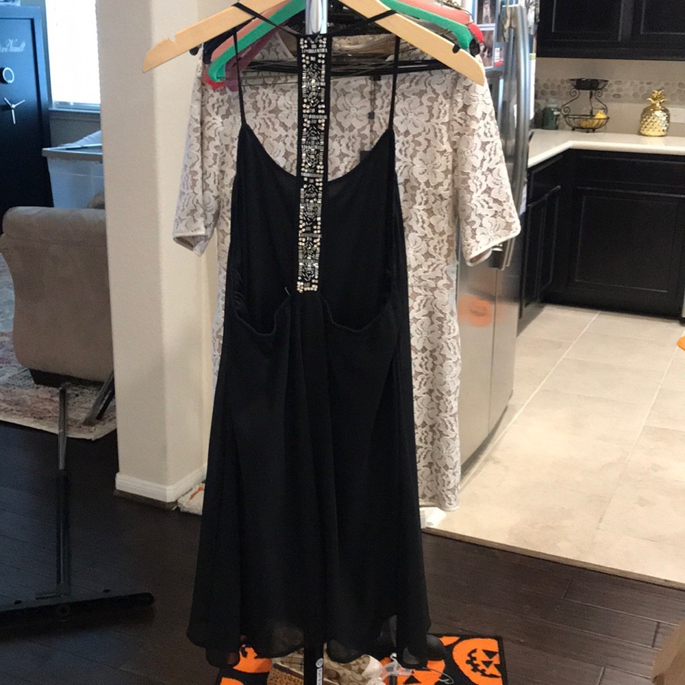 Black mini dress with embellishment in back